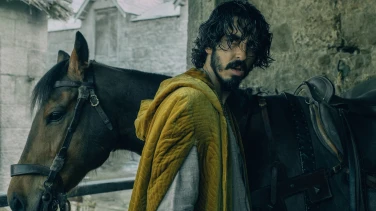 The Green Knight film trailer button